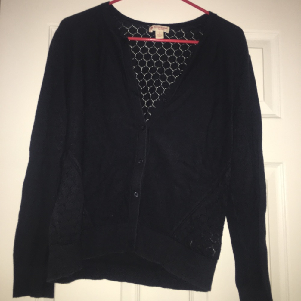 Blue cardigan sweater.